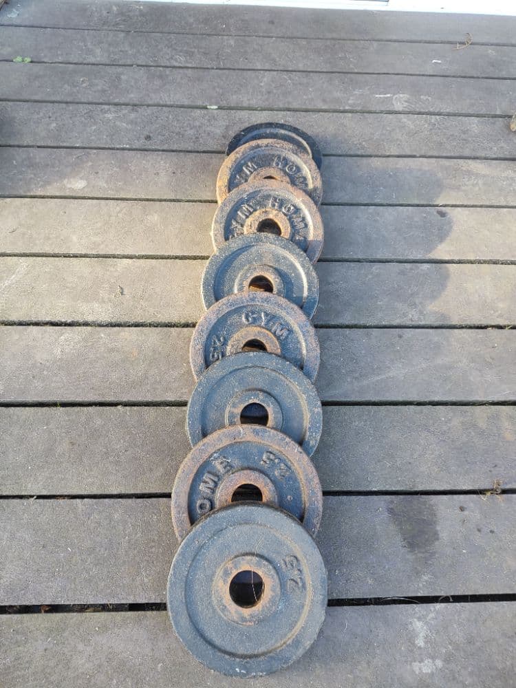 8 discos de 2.5 kg de fundición
